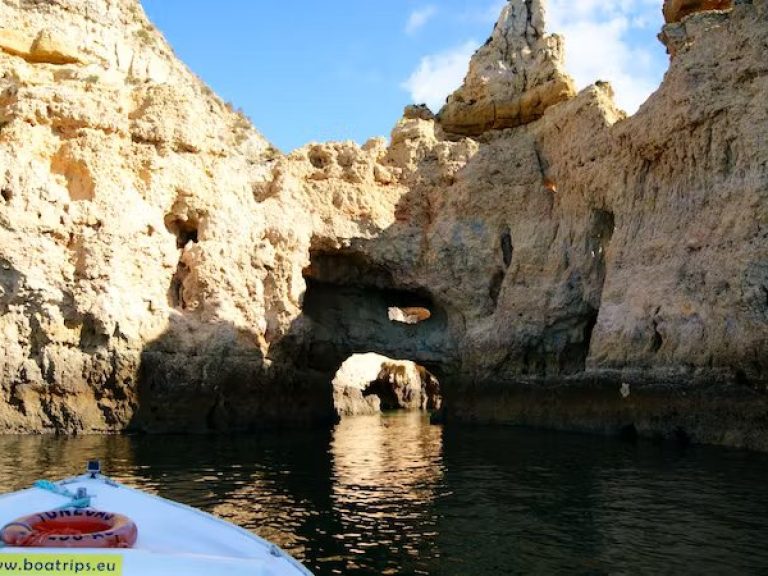 Boat Cruise to Ponta da Piedade: Experience the Spectacular Ponta da Piedade on a Charming Boat Cruise from Lagos. Embark on a delightful boat cruise to Ponta da Piedade and immerse yourself in the enchanting coastal scenery of the Algarve. Sail the seas in true Portuguese style aboard a traditional boat, and get ready to explore the rugged sea caves and witness the dramatic rock formations of Ponta da Piedade.